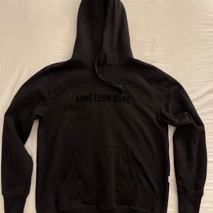 Aimé Leon Dore black hoodie.